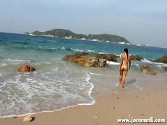 thai girl joon mali teasing on the shore