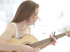 Beauty gives up strumming her guitar to fuck this stud