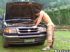 Working hard on the car has him horny for lusty gay anal