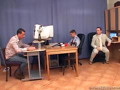 Sexy office assistant does a gangbang with her bosses