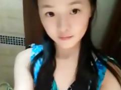19yo chinese girl dances, strips and plays with her hairy pussy.
