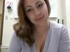 Bosomy chick kneads and sucks her lactating boobs in front of a webcam