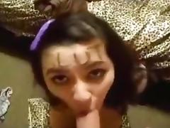 girl with 'slut' written on her forehead sucks cock and spits out the cum
