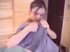 Cute asian girl with big firm boobs gets fucked in missionary position, while standing up.