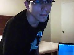 Nerd sets up a cam and gets a handjob from a girl