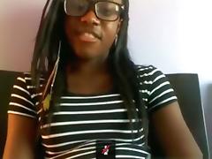 Black nerd with glasses masturbates with a hairbrush on her bed on skype