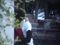Voyeur tapes a girl couple making-out in public, while masturbating eachother.
