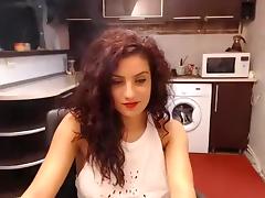 Curllynelly settled in the kitchen in front of webcam