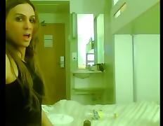Spanish tgirl with a five o'clock shadow sucks some guy's dick in a hotel room