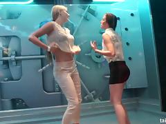 Hot babes dance around while being sprayed with water