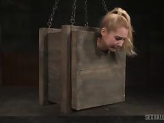 Odette finds herself in wooden box with the black cock close to her