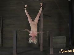Blonde called Cherry tortured while hanging upside down in the dungeon