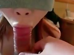 cute japanese blindfolded babe leans in to suck on my cock