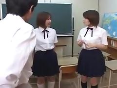 Two Japanese school girl spitting on teacher