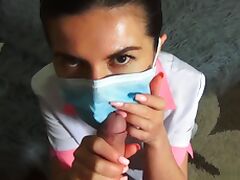 Nurse Gives Blowjob Through Two Masks