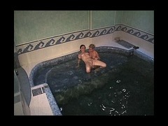 Two luscious babes Two luscious babes were lazily fondling each other in the swimming pool when thei