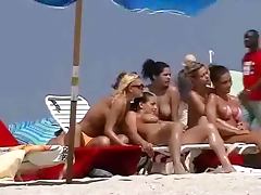 Nude beach hotties get filmed with a hidden cam while having rest