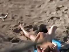 Oral Stimulation sex in 69 on a beach voyeur
