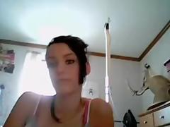 Bewitching young masturbates obscene cleft on webcam