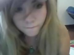 Cute golden-haired angel undresses on web camera