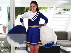 Stunning Gigi Marie poses in sexy cheerleader uniform
