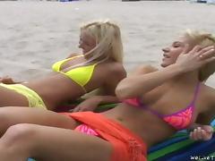 Three slim chicks make lesbian love after sunbathing at a beach