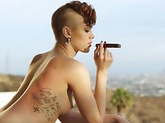 Fancy Britt is smoking that cigar