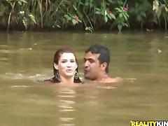 Sexy Dani Duran swims in a lake and fucks on a lawn