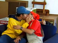 Two Latin dudes fuck and finger their asses lying on an armchair