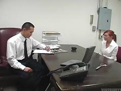 Tattooed redhead secretary knows how to relax her boss