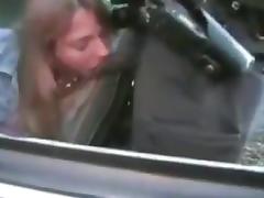 Darksome cop facefucks chained white wench in patrol car