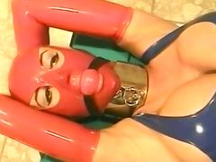 Extremely busty babe in latex gets tortured